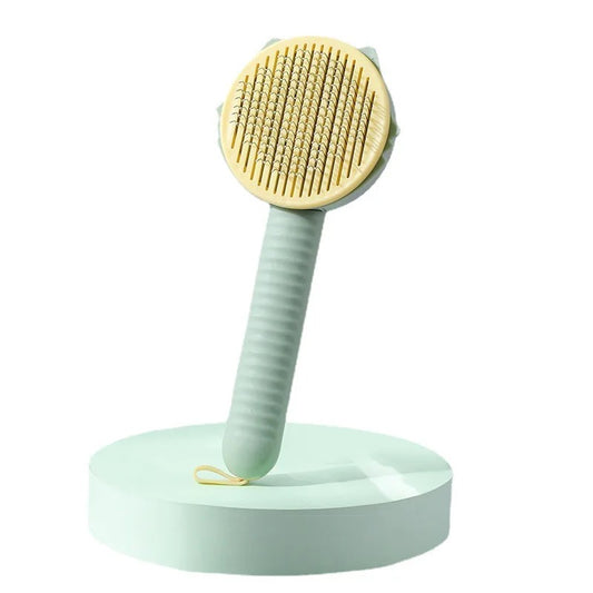 Comb with a button